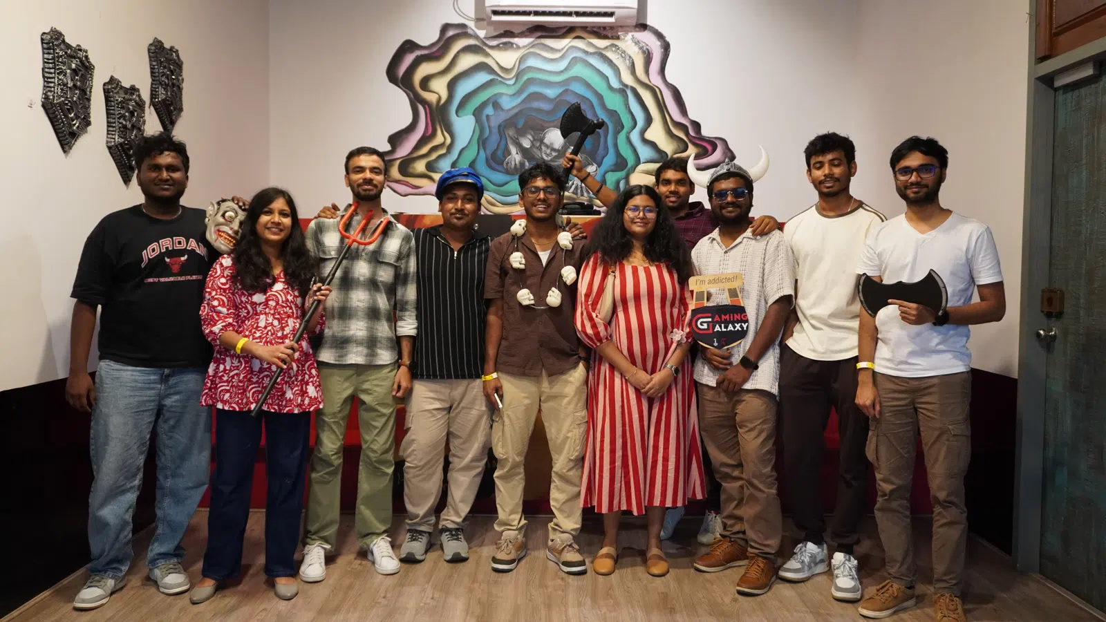 Group photo inside Gamingalaxy escape game area after completing a mission
